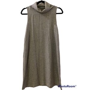 gray high-neck sleeveless dress.